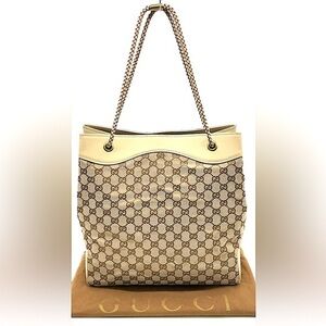 • Gucci monogram canvas and leather bucket bag